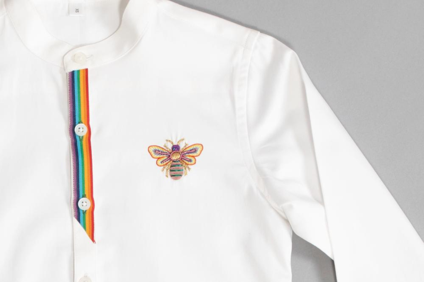 LETS BUSS THE TOWN WITH A RAINBOW BEE SHIRT.