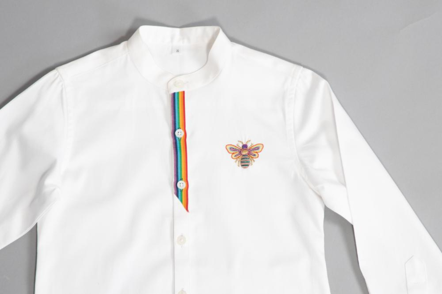 LETS BUSS THE TOWN WITH A RAINBOW BEE SHIRT.