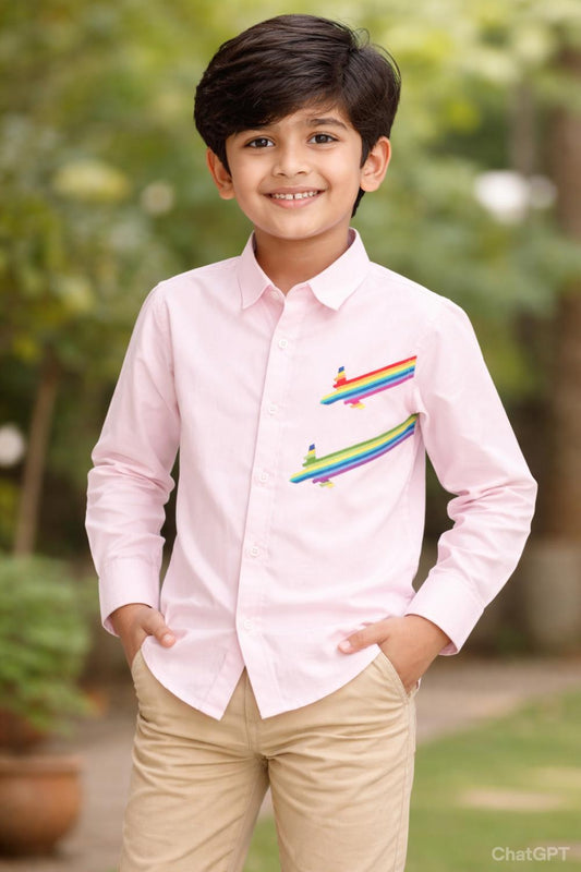 The rainbow aeroplane landing on a pink shirt
