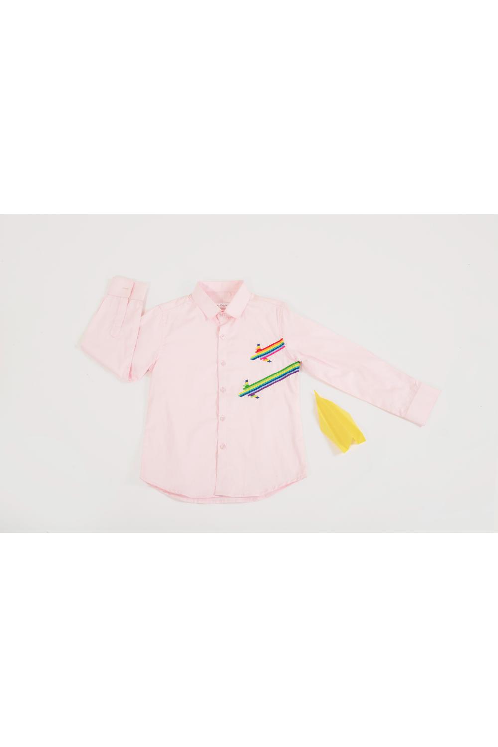 The rainbow aeroplane landing on a pink shirt