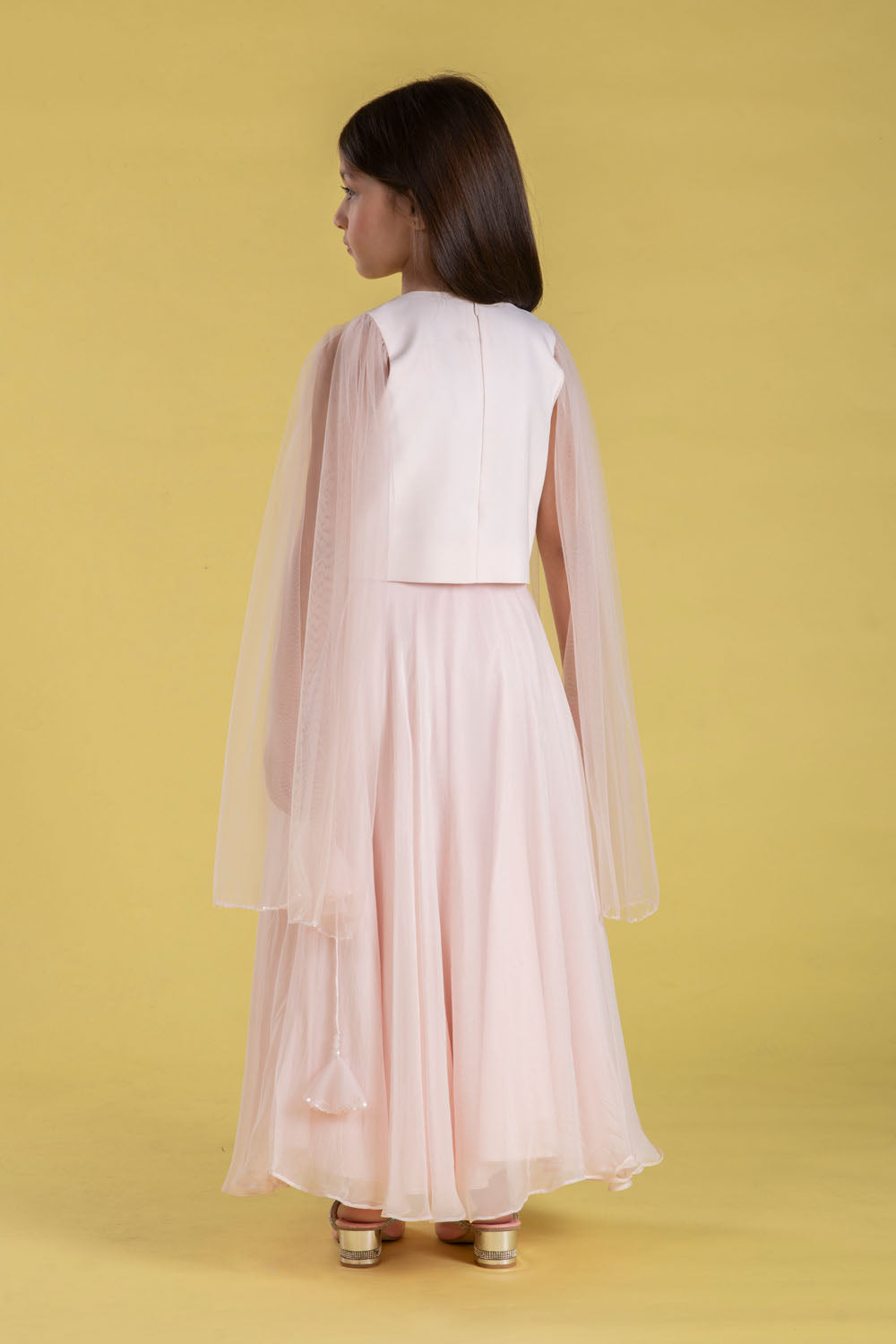 A FAIRYTALE BLUSH PINK LEHENGA SET FEATURING A BEAUTIFULLY EMBELLISHED PEARL SEQUIN BLOUSE WITH SHEER FULL FAIRY SLEEVES